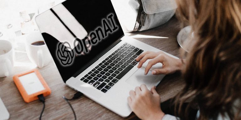 A person sitting at a laptop with the words Open AI superimposed over the screen.